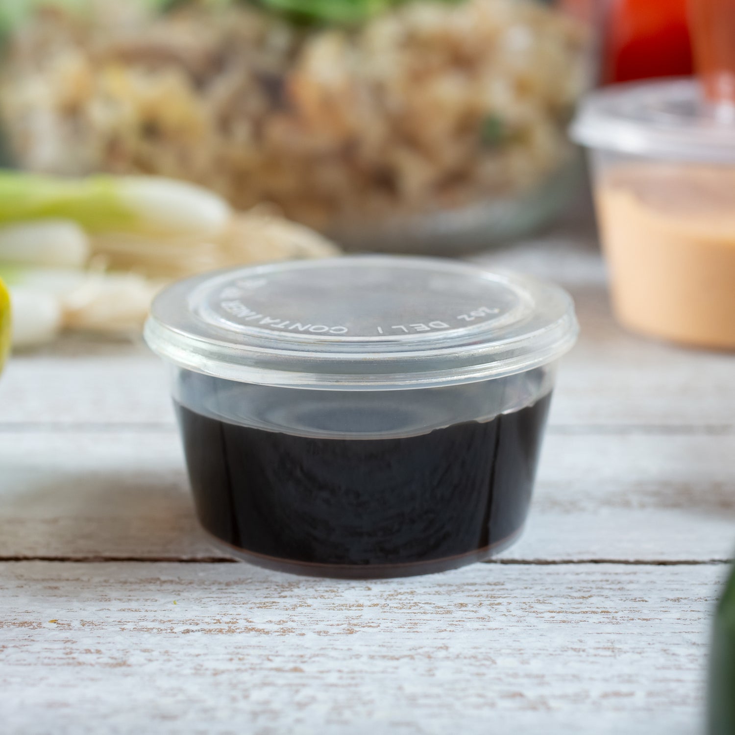 ezSelect Portion Cup with Hinged Lid (2 oz, Clear) - 2000/case - ReztaurantDirect