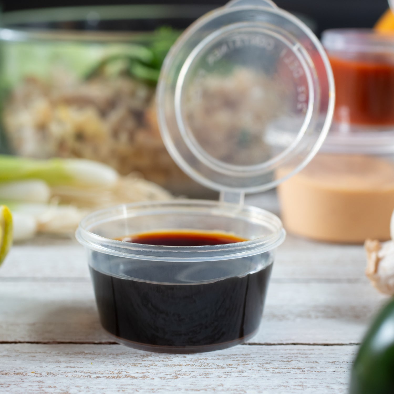 ezSelect Portion Cup with Hinged Lid (2 oz, Clear) - 2000/case - ReztaurantDirect